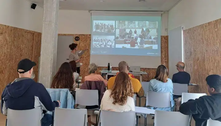 Job training session in a classroom with a projector